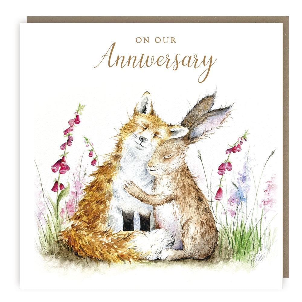 Love Country card with the words On Our Anniversary with a fox and hare surrounded by wild flowers
