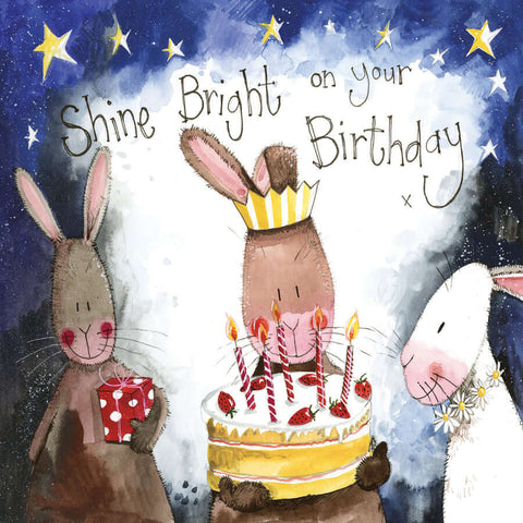 Alex Clark Birthday card with three rabbits and a lit birthday cake